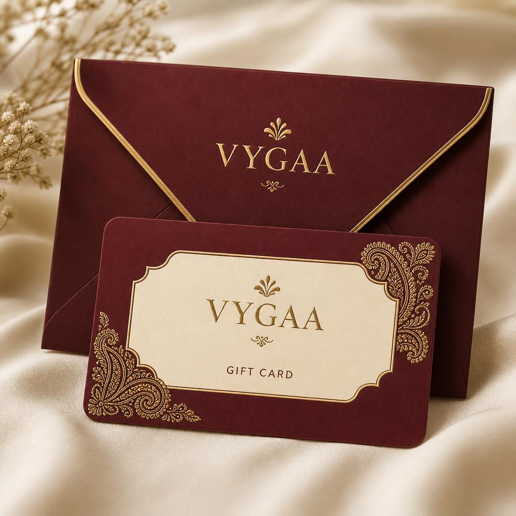 Elegant VYGAA gift card in a premium burgundy envelope with gold Indian-inspired detailing